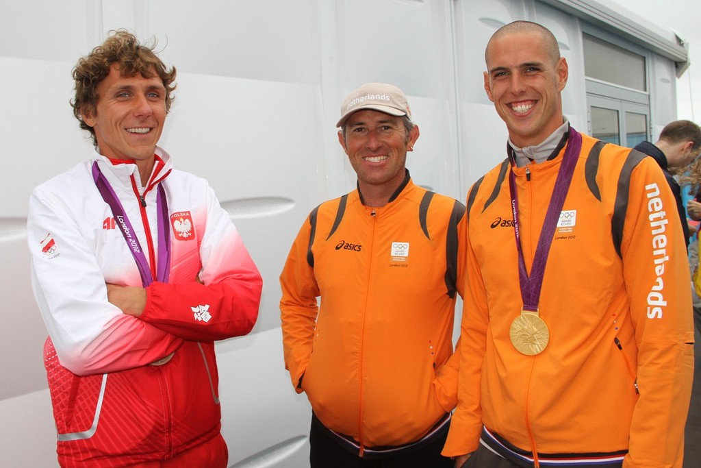  August 7, 2012 - Weymouth, England -  Miarczynski (POL - Bronze medalist), Aaron MacIntosh (NZL - NED Coach), and Dorian van Rijsseleberge (NED - Gold Medalist) © Richard Gladwell www.photosport.co.nz
